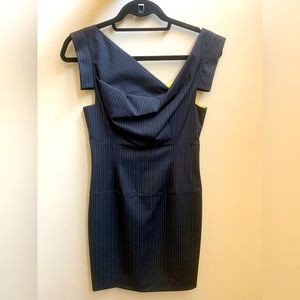 Stunning pinstripe Black Halo Jackie O mini dress with yellow lining.